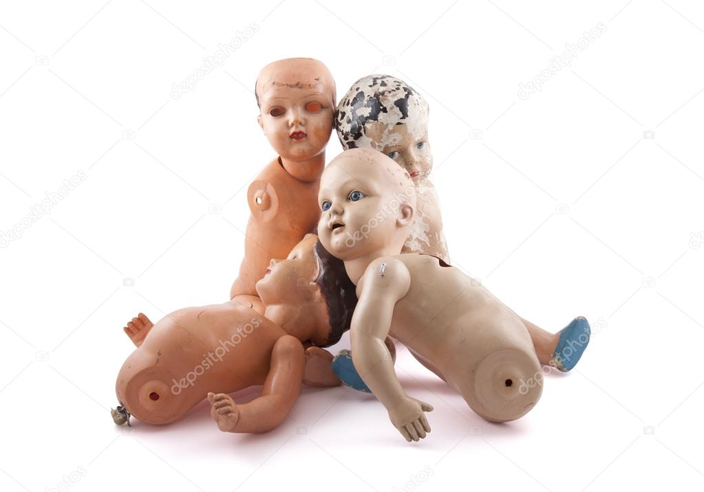 Creepy dolls isolated on white with clipping path