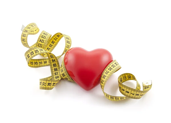 Red heart with yellow tape measure. Clipping path included. — Stock Photo, Image