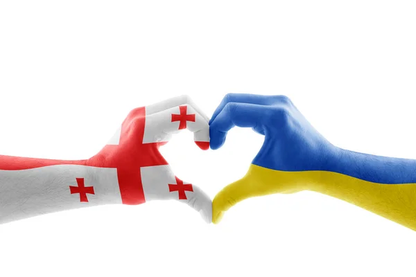 Två Händer Form Hjärta Med Georgiska Och Ukrainska Flagga Isolerad — Stockfoto
