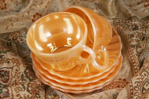 Golden tea cups — Stock Photo, Image
