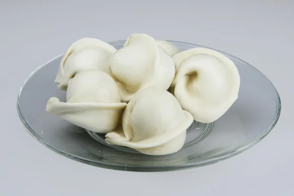 Pelmeni on a plate — Stock Photo, Image