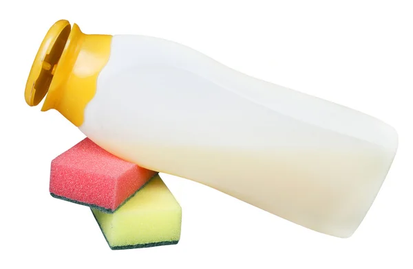 Garrafa com xampu e uma esponja para lavar — Fotografia de Stock