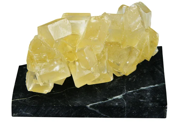 Cristal de sucre jaune sur un support de néphrite noire — Photo