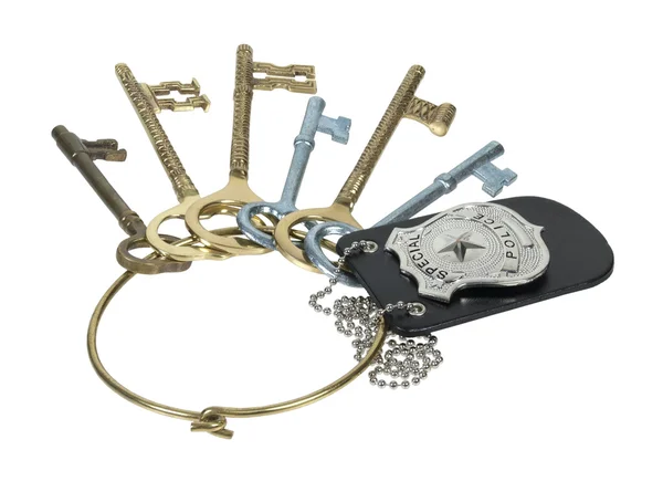 Politie badge op ring van sleutels — Stockfoto