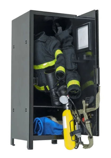 Engrenagem de bombeiro em um armário — Fotografia de Stock