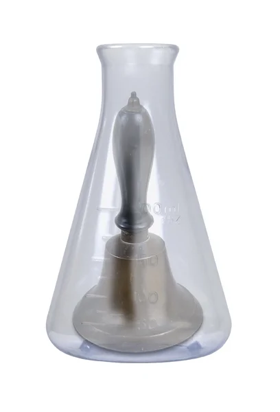School Bell in a Glass Beaker — Stock Photo, Image