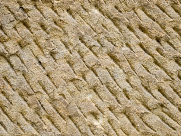 Mão esculpida textura de pedra — Fotografia de Stock