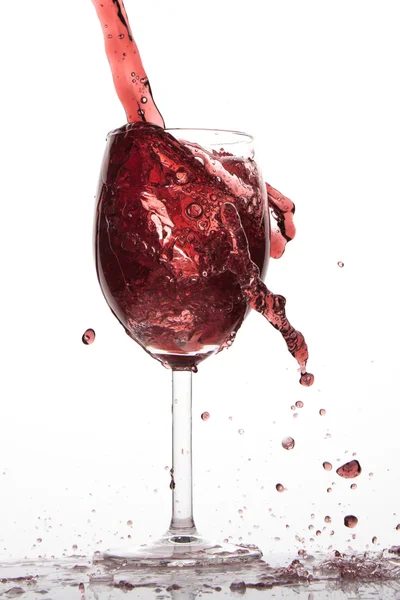 Pouring red wine — Stock Photo, Image