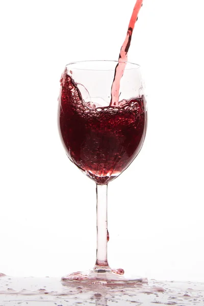 Pouring red wine — Stock Photo, Image