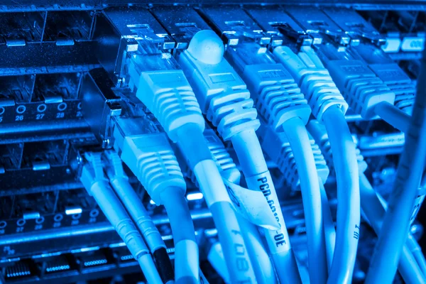 Network hub and patch cables — Stock Photo, Image