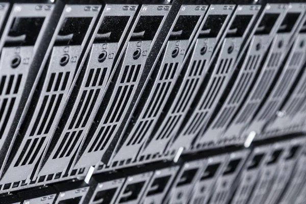 Row of hard disks used for data storage in internet data center