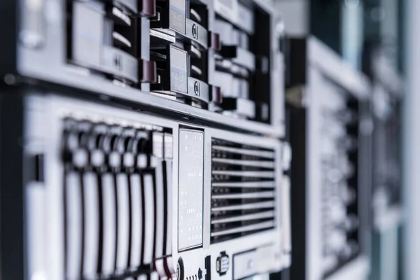 Row of hard disks used for data storage in internet data center