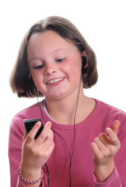 Girl listening to mp3 player — Stock Photo, Image