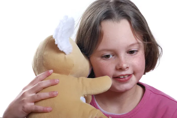 Young girl cuddling teddy bear — Stock Photo, Image