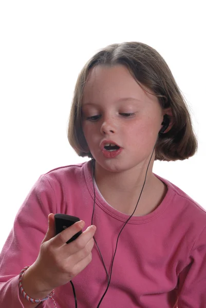 Girl listening to mp3 player — Stock Photo, Image