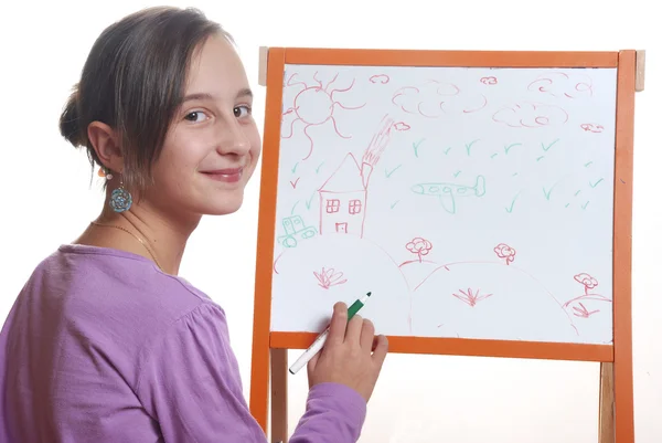 Menina jovem desenho no quadro branco — Fotografia de Stock