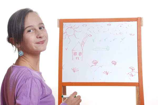 Young girl drawing on the white board — Stock Photo, Image