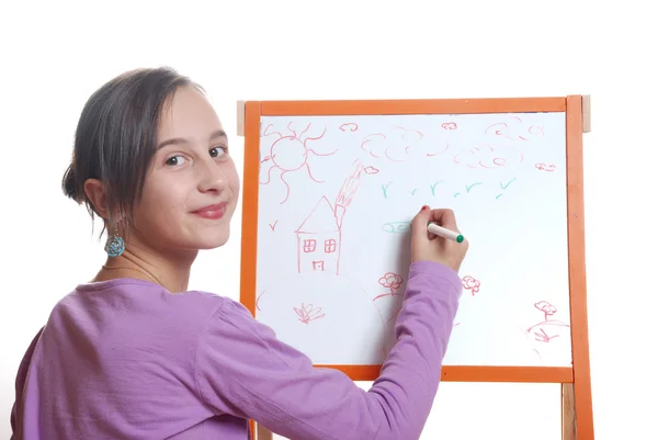 Menina jovem desenho no quadro branco — Fotografia de Stock