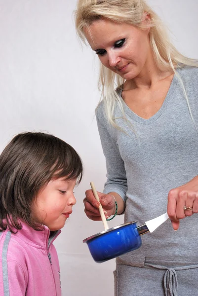 Woman with a pan — Stock Photo, Image