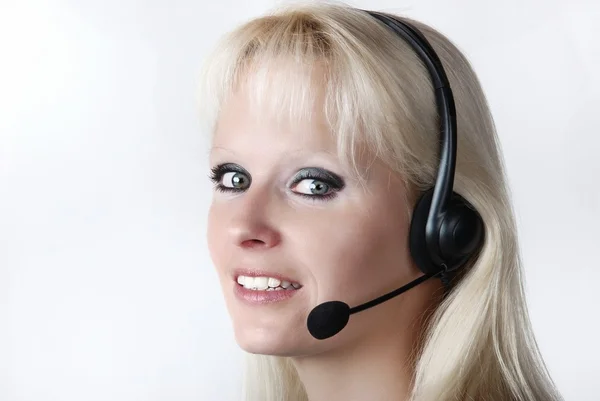 Porträt einer jungen Frau mit Headset — Stockfoto