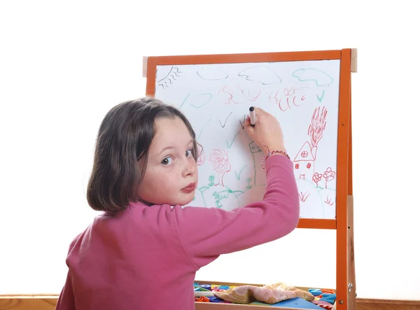 Young girl drawing on the white board — Stock Photo, Image