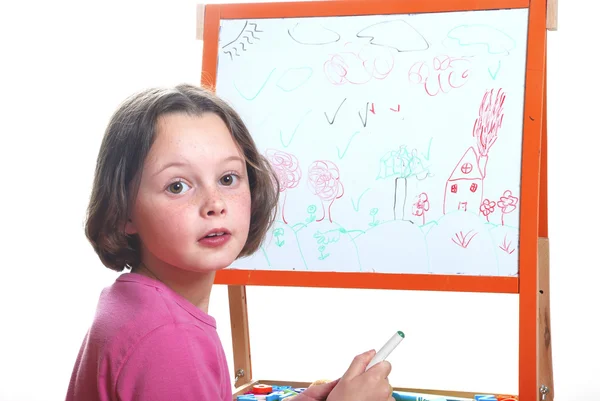 Young girl drawing on the white board — Stock Photo, Image