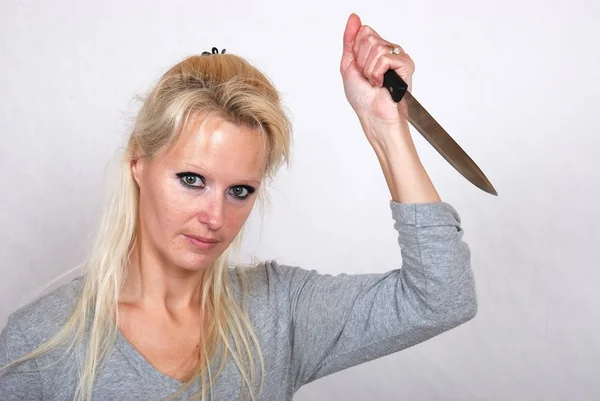Femme avec couteau — Photo