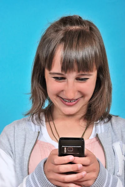 Fille avec un téléphone mobile — Photo