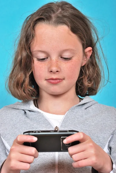 Menina com um telefone celular — Fotografia de Stock