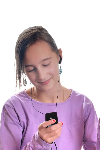 Girl listening to mp3 player — Stock Photo, Image