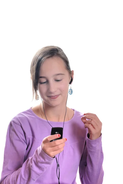 Girl listening to mp3 player — Stock Photo, Image