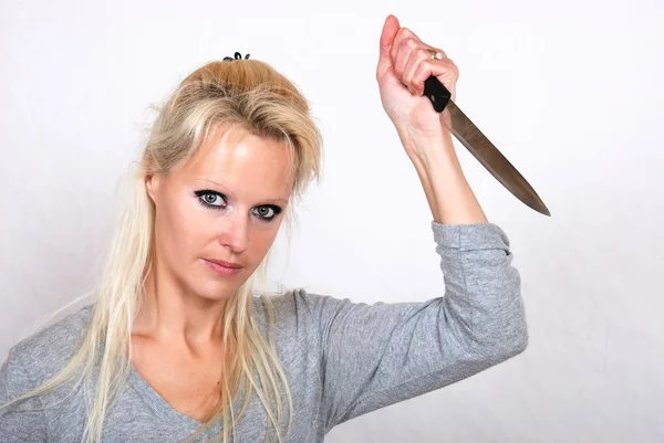 Femme avec couteau — Photo