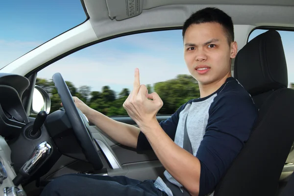 Hombre enojado conduciendo Imagen de stock