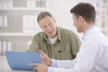 Doctor talking to patient clipart
