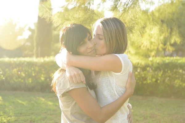 Lesbian girl hugging her girlfriend — Stock Photo, Image