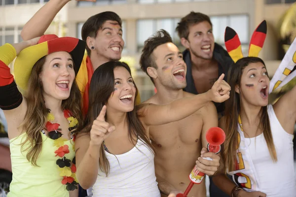 Enthusiastic German sport soccer fans — Stock Photo, Image