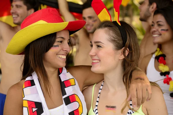 German girls friends soccer fans celebrating — Stock Photo, Image