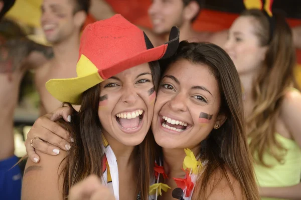 Happy couple of girlfriends sport soccer fans — Stock Photo, Image