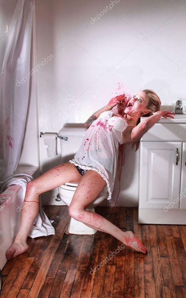 Woman in a Bloody Crime Scene in a Bathroom