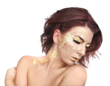 altın varak kozmetik ile süslenmiş güzel bir kadın
