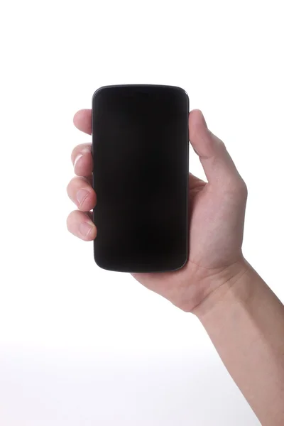 Рука с сенсорным смартфоном — стоковое фото