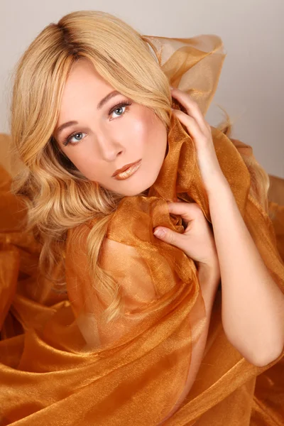 Woman Wrapped in Copper Flowing Fabric — Stock Photo, Image