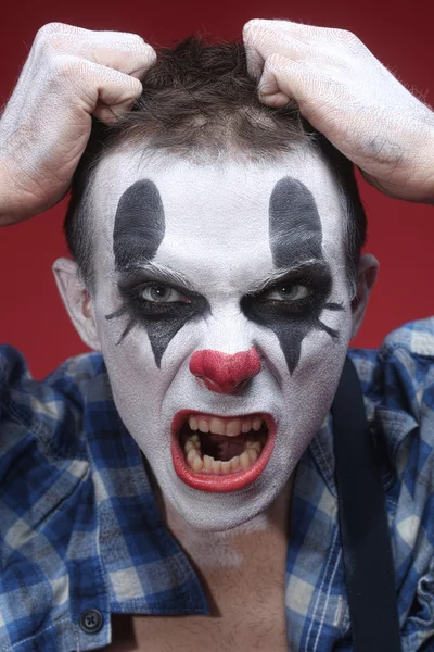 Spooky Clown Portrait on Red Background — Stock Photo, Image