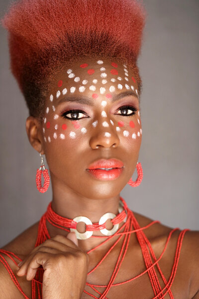 Expressive African American Woman with Dramatic Lighting
