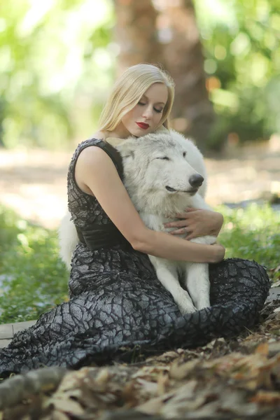 Lovely Woman Posing With a Wolf — Stock Photo, Image