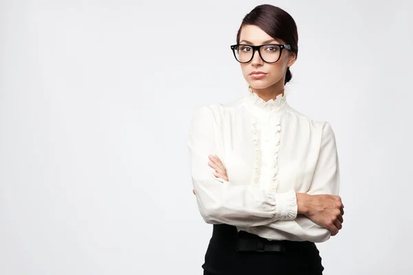 Strict woman in large glasses — Stock Photo, Image