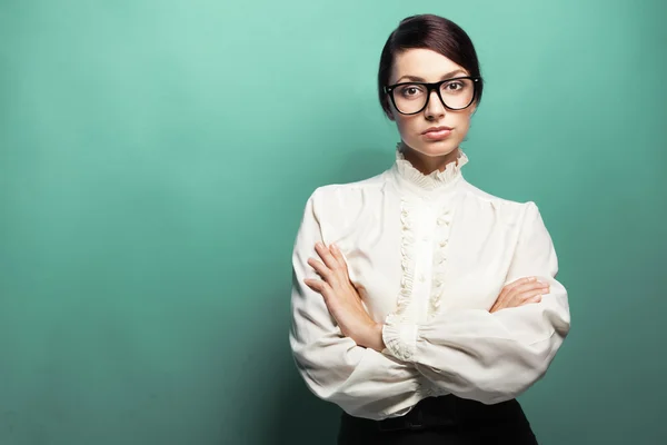 Strict woman in large glasses Stock Image