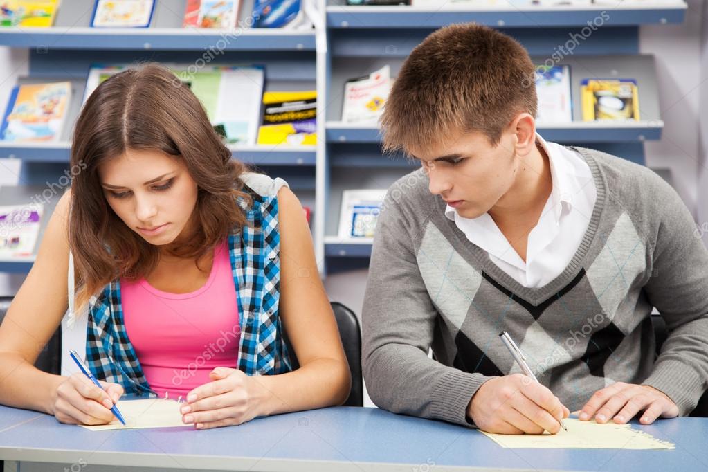 Student cheating at test exam — Stock Photo © gdolgikh 16969915
