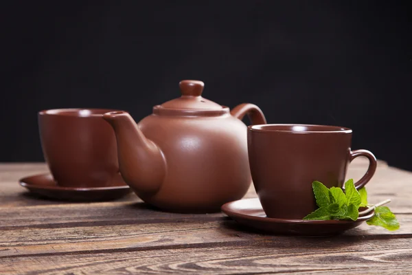 Tea with mint on a wooden table — Stock Photo, Image