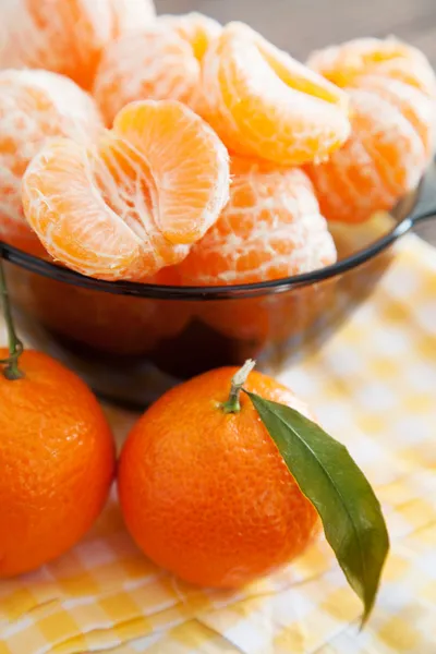 Peeled tangerines on a table — Stock Photo, Image